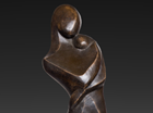 A tall elegant figure of a young Mother tenderly holding her baby. Despite being abstracted the sculpture has an emotion feel and the lines of design enhance its' free standing simplicity.
Patinated in a mid bronze with highlights.